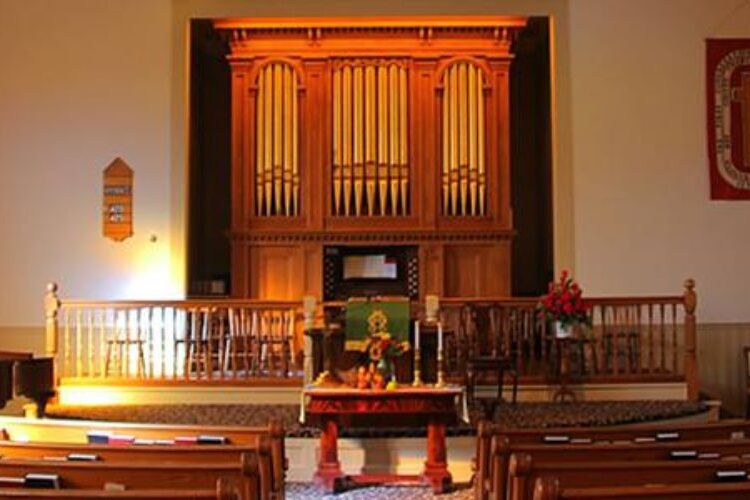 Front of sanctuary with organ and communion table